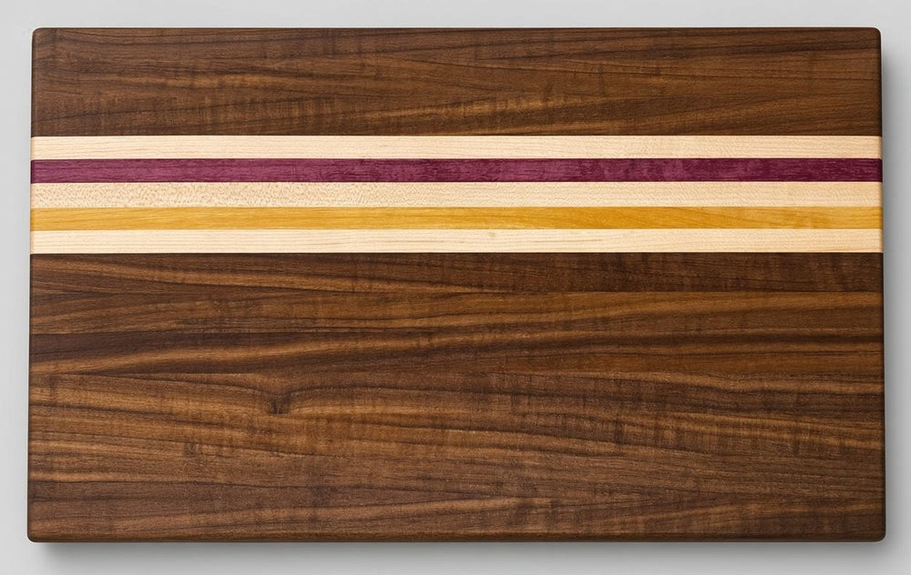 Walnut edge grain cutting board with contrasting stripes
